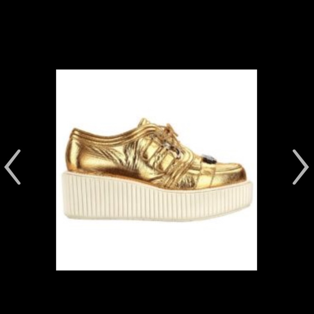 CHANEL Gold Platform Sneakers